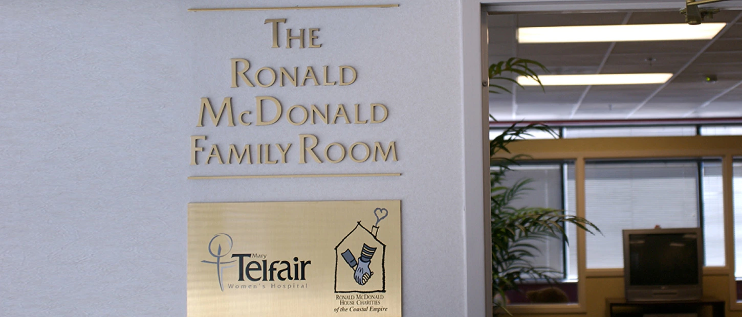 the Ronald McDonald Family Room Signage with room sponsor information
