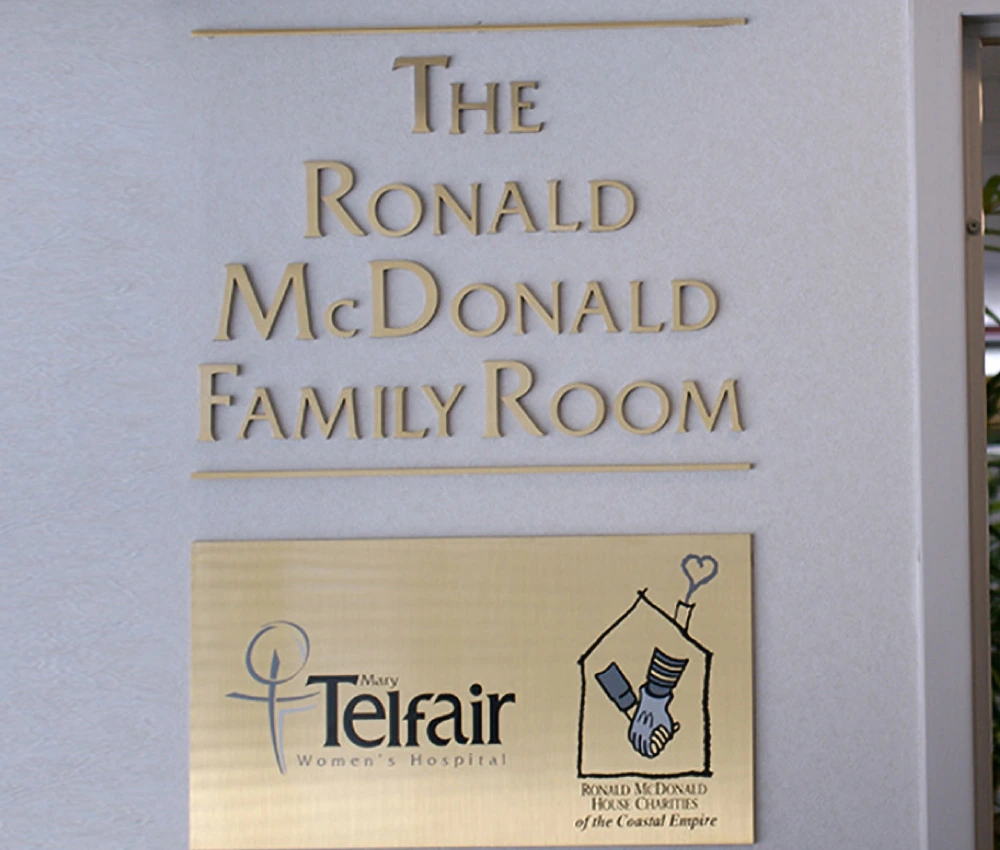 the Ronald McDonald Family Room Signage with room sponsor information