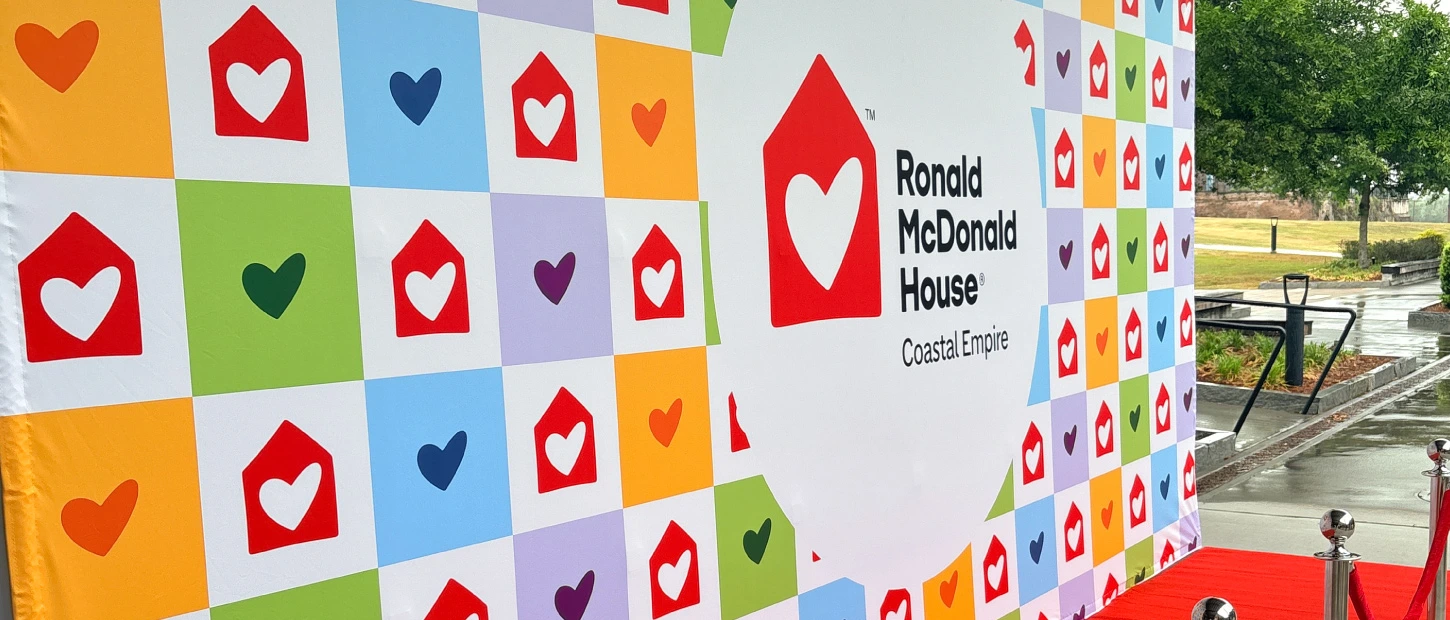 Ronald McDonald House Coastal Empire backdrop and red carpet at an event
