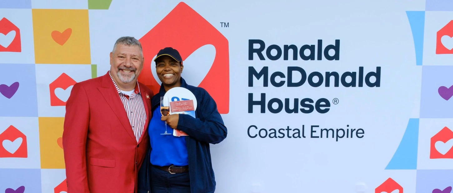 McDonald's manager with our CEO on red carpet at Ronald McDonald House Coastal Empire event