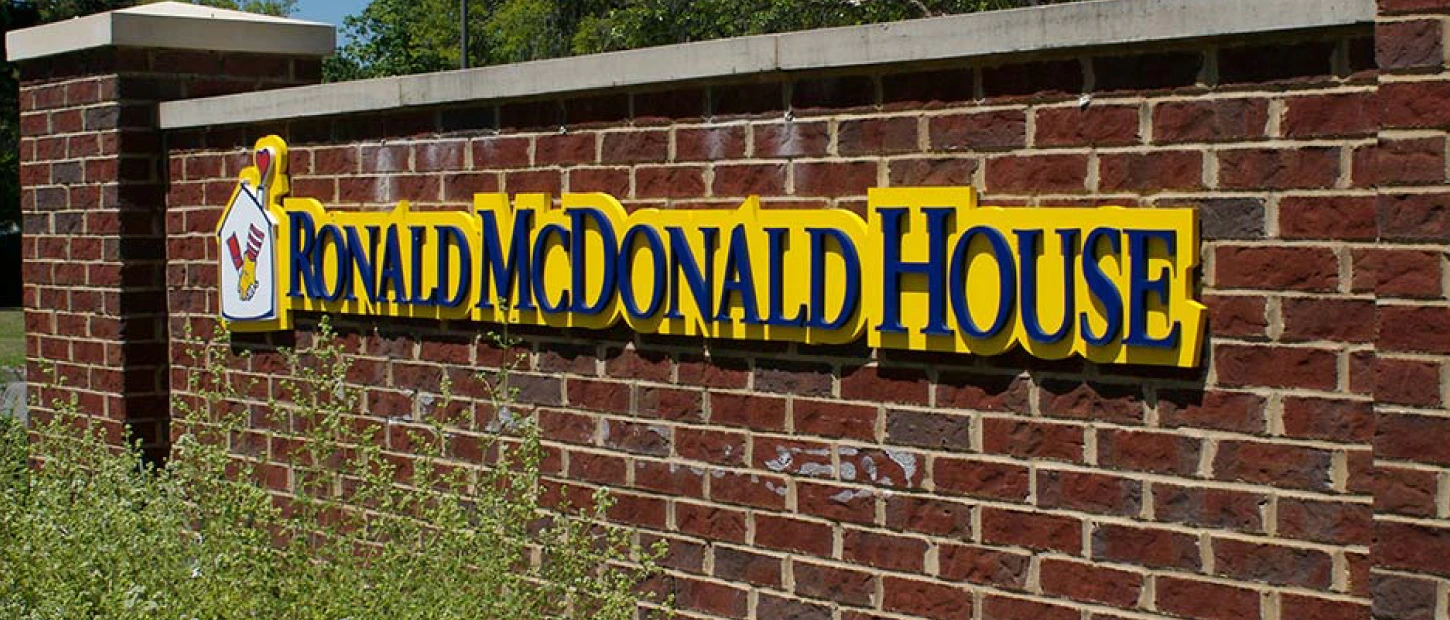brick wall with Ronald McDonald House signage